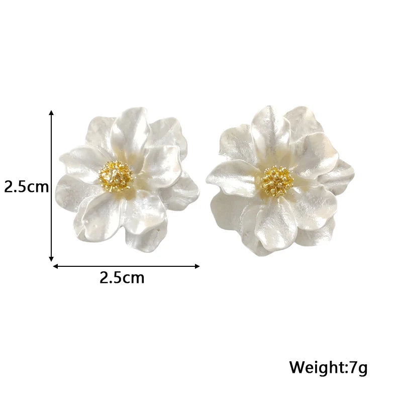 Σκουλαρίκια blommörhängen από λευκό ακρυλικό